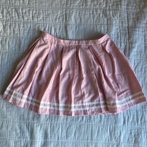pastel pink pleated skirt